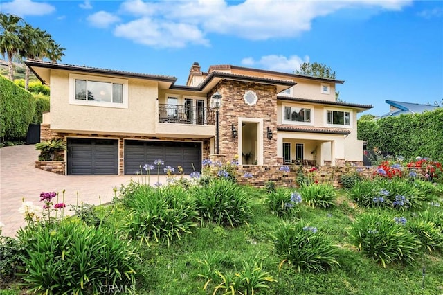 19151 Fowler Ave, North Tustin, CA 92705 - view of front facade with a balcony, stucco siding, stone siding, and a chimney