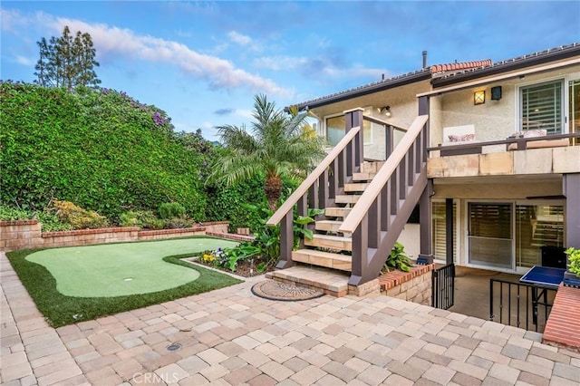 19151 Fowler Ave, North Tustin, CA 92705 - view of patio with a putting green and stairs