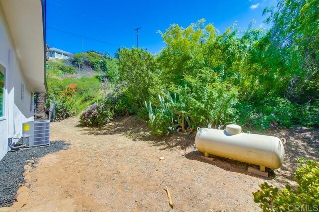 view of yard featuring cooling unit