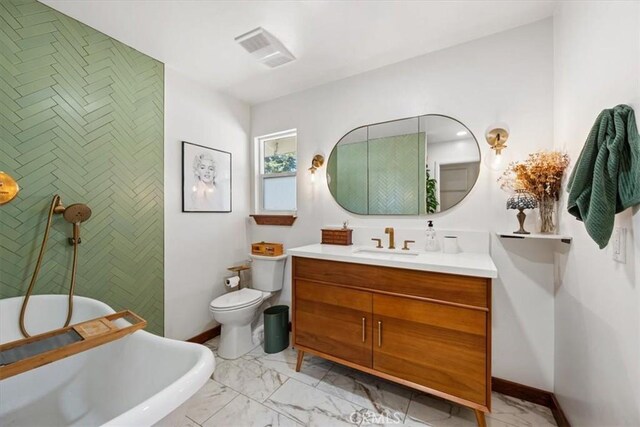 636 Jameson, Arroyo Grande, CA 93420 - full bathroom featuring marble finish flooring, a soaking tub, toilet, baseboards, and vanity