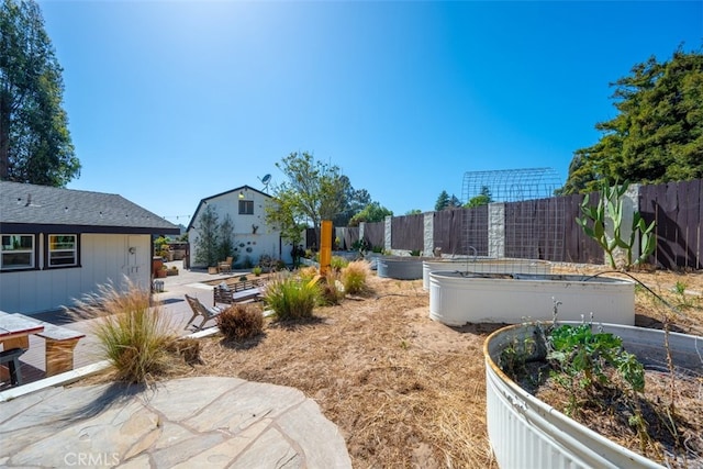 636 Jameson, Arroyo Grande, CA 93420 - view of yard featuring a vegetable garden and a patio area