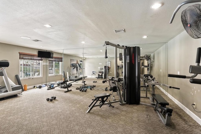 14936 Avenida Venusto Unit 12, San Diego, CA 92128 - workout area featuring carpet floors, baseboards, a textured ceiling, recessed lighting, and french doors