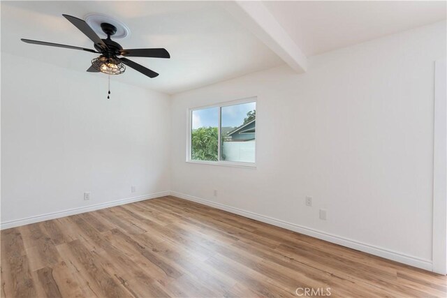 15821 Willett Ln, Huntington Beach, CA 92647 - empty room featuring beam ceiling, light wood-style floors, baseboards, and ceiling fan