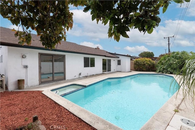 15821 Willett Ln, Huntington Beach, CA 92647 - view of swimming pool featuring a fenced backyard, a patio, and a pool with connected hot tub