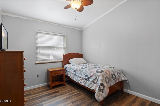 bedroom with wood finished floors, baseboards, and a ceiling fan