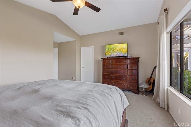 41488 Yankee Run Ct, Temecula, CA 92591 - bedroom with light colored carpet, multiple windows, vaulted ceiling, and ceiling fan