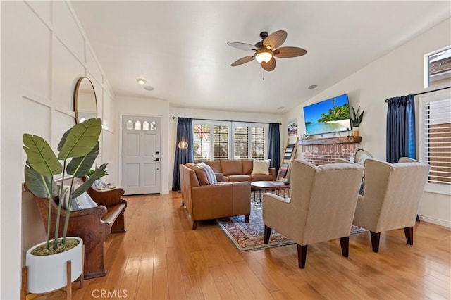 41488 Yankee Run Ct, Temecula, CA 92591 - living area with vaulted ceiling, ceiling fan, and light wood-type flooring
