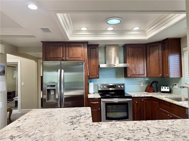 2147 Ronda Granada Unit A, Laguna Woods, CA 92637 - kitchen featuring appliances with stainless steel finishes, wall chimney exhaust hood, ornamental molding, a sink, and tasteful backsplash