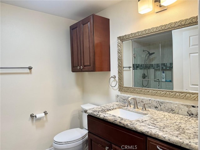 2147 Ronda Granada Unit A, Laguna Woods, CA 92637 - bathroom featuring a stall shower, toilet, and vanity