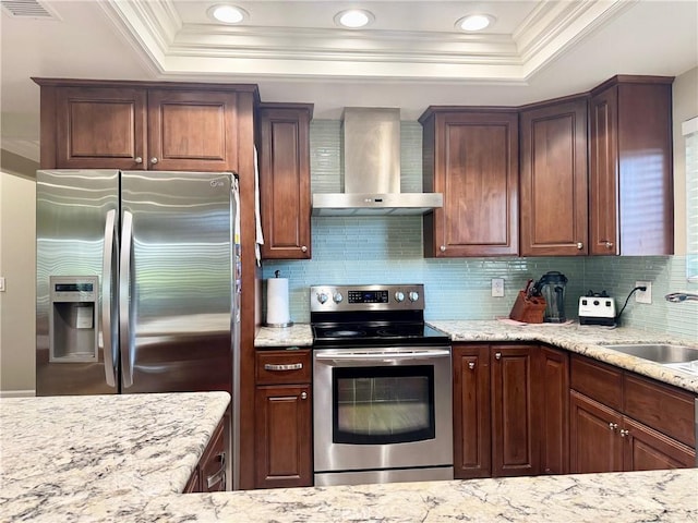 2147 Ronda Granada Unit A, Laguna Woods, CA 92637 - kitchen featuring wall chimney range hood, stainless steel appliances, ornamental molding, a sink, and a raised ceiling