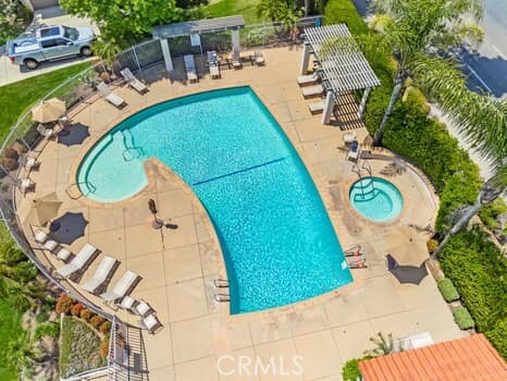 11255 Key W Ave Unit 2, Porter Ranch, CA 91326 - community pool with a patio and a pergola