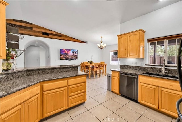 7356 Rubidoux Ave, Yucca Valley, CA 92284 - kitchen with dishwashing machine, a sink, vaulted ceiling, light tile patterned flooring, and a chandelier