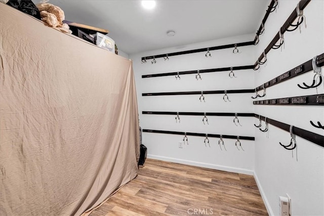 7356 Rubidoux Ave, Yucca Valley, CA 92284 - walk in closet with light wood-style floors