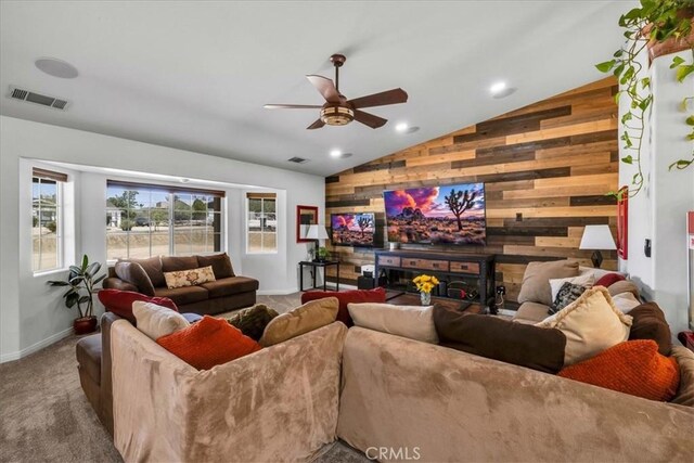 7356 Rubidoux Ave, Yucca Valley, CA 92284 - living area featuring wooden walls, lofted ceiling, ceiling fan, carpet flooring, and recessed lighting