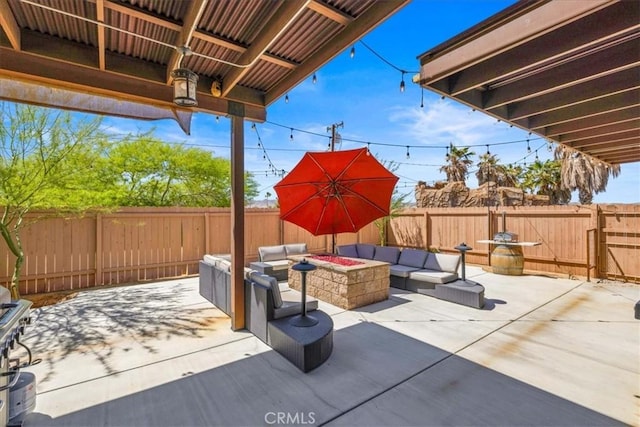7356 Rubidoux Ave, Yucca Valley, CA 92284 - view of patio featuring an outdoor living space with a fire pit and a fenced backyard