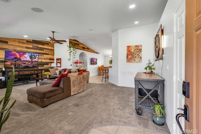 7356 Rubidoux Ave, Yucca Valley, CA 92284 - carpeted living area with lofted ceiling, ceiling fan, wooden walls, and recessed lighting