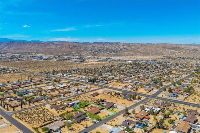 7356 Rubidoux Ave, Yucca Valley, CA 92284 - aerial perspective of suburban area with a mountain backdrop and a desert landscape