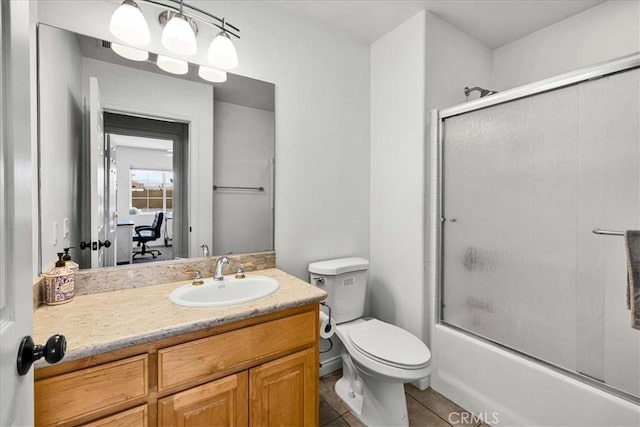7356 Rubidoux Ave, Yucca Valley, CA 92284 - full bathroom with tile patterned flooring, toilet, vanity, and shower / bath combination with glass door