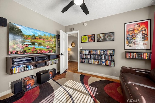 1418 S Cedar Ave, Fullerton, CA 92833 - sitting room featuring ceiling fan, baseboards, a textured ceiling, and carpet flooring