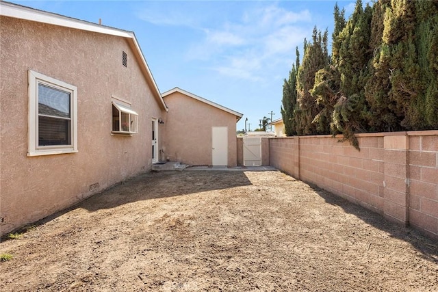 1418 S Cedar Ave, Fullerton, CA 92833 - fenced backyard featuring a gate