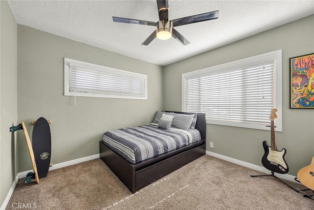 1418 S Cedar Ave, Fullerton, CA 92833 - bedroom with carpet flooring, a ceiling fan, a textured ceiling, and baseboards