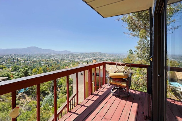 wooden terrace with a mountain view