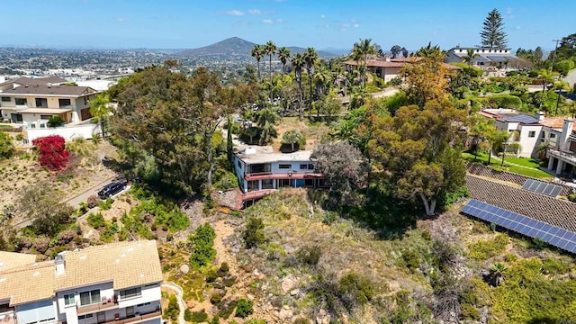 aerial perspective of suburban area featuring a mountain backdrop