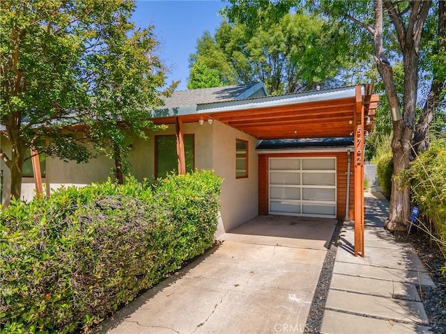 5762 Andasol Ave, Encino, CA 91316 - view of front of property featuring concrete driveway and stucco siding