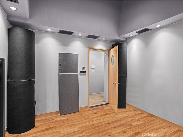 5762 Andasol Ave, Encino, CA 91316 - spare room featuring wood finished floors and recessed lighting