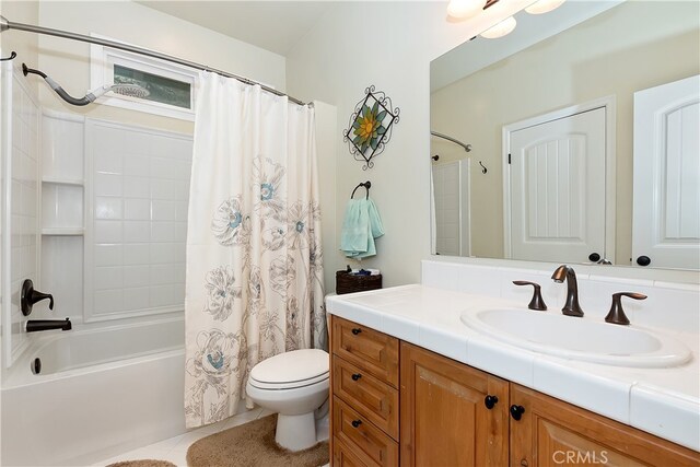 23776 Lakeview Dr, Crestline, CA 92325 - full bath featuring toilet, shower / tub combo, vanity, and tile patterned floors