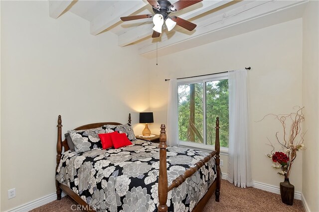 23776 Lakeview Dr, Crestline, CA 92325 - carpeted bedroom featuring beamed ceiling, baseboards, and a ceiling fan