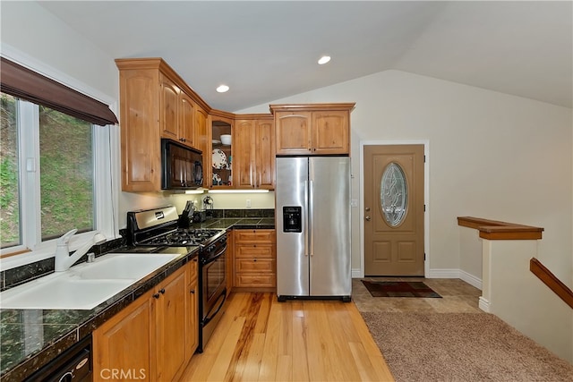 23776 Lakeview Dr, Crestline, CA 92325 - kitchen featuring stainless steel fridge, range with gas stovetop, black microwave, a sink, and vaulted ceiling