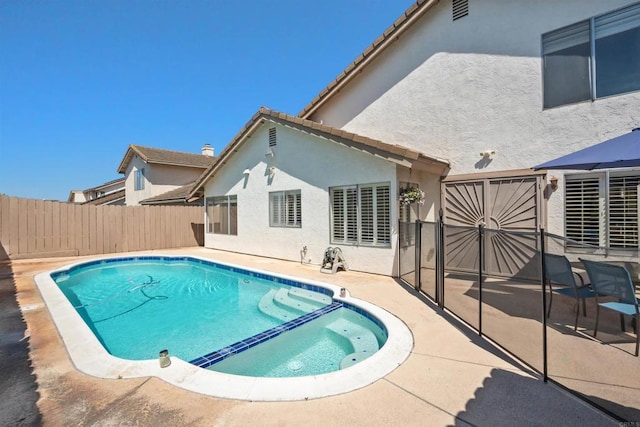 7763 Gaston, San Diego, CA 92126 - view of swimming pool featuring a patio, fence, and a pool with connected hot tub