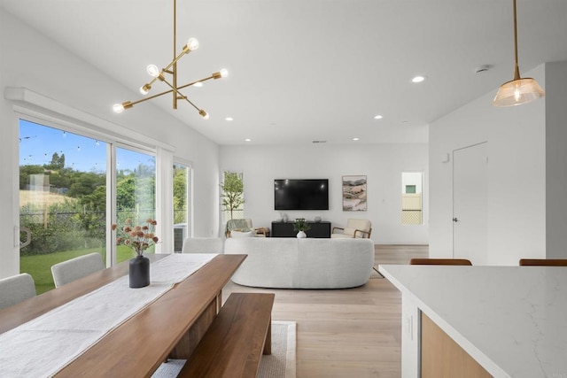 2210 Bonita Ct, Lemon Grove, CA 91945 - dining area with recessed lighting, light wood-style flooring, and a chandelier