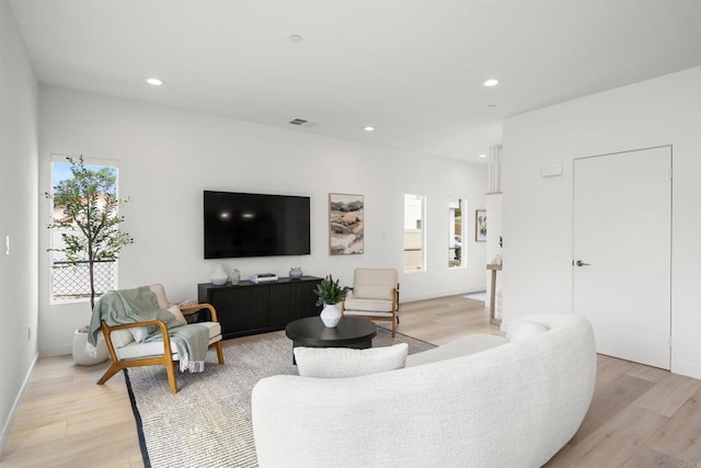 2210 Bonita Ct, Lemon Grove, CA 91945 - living room with light wood-type flooring and recessed lighting