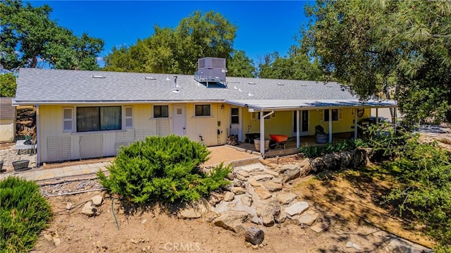 43096 Deer Trail Way, Coarsegold, CA 93614 - back of house with a patio and roof with shingles