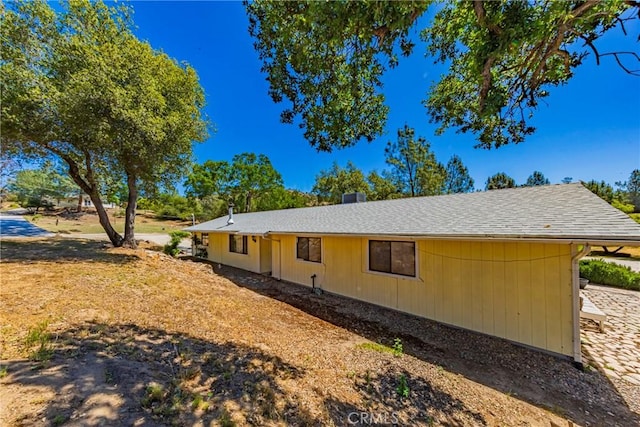 43096 Deer Trail Way, Coarsegold, CA 93614 - view of side of home featuring a shingled roof and a chimney