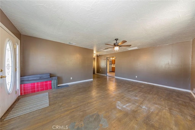 43096 Deer Trail Way, Coarsegold, CA 93614 - empty room with wood finished floors, baseboards, ceiling fan, and a textured ceiling