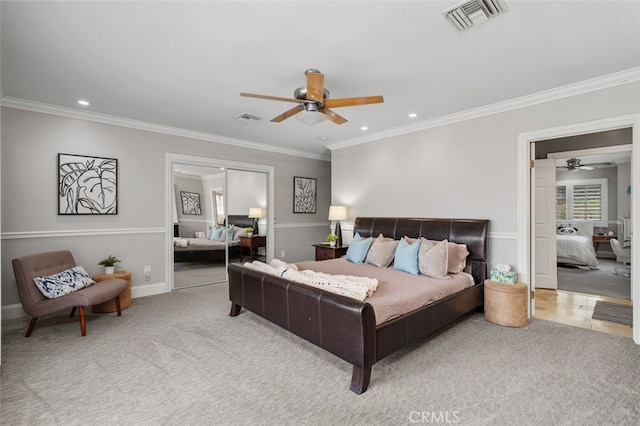 carpeted bedroom with crown molding, recessed lighting, and a ceiling fan