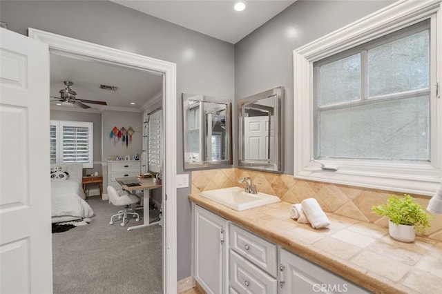 bathroom with backsplash, ensuite bath, ceiling fan, vanity, and recessed lighting