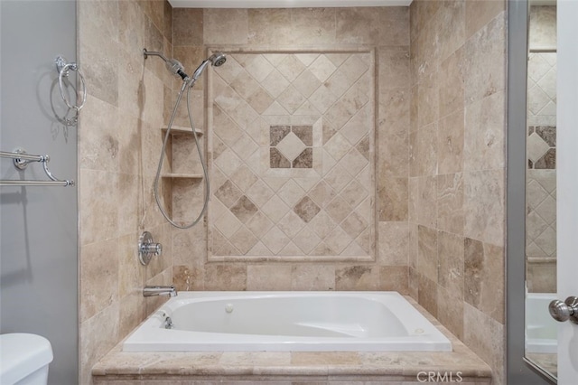 full bath with tiled shower / bath combo and toilet