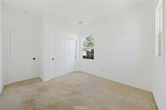 3933 E Bethany Way, Ontario, CA 91761 - unfurnished bedroom featuring carpet floors, baseboards, and a closet
