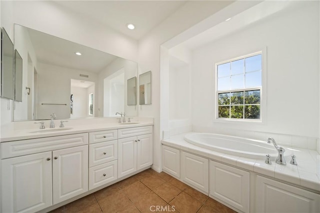 3933 E Bethany Way, Ontario, CA 91761 - full bath featuring tile patterned floors, a bath, double vanity, and recessed lighting