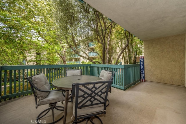 448 N Bellflower Blvd Unit 119, Long Beach, CA 90814 - view of patio with outdoor dining space