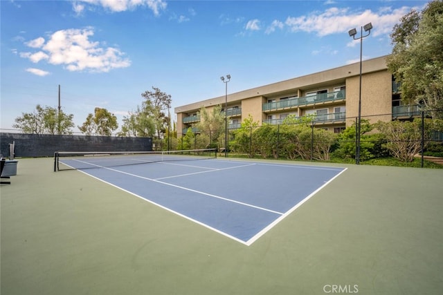 448 N Bellflower Blvd Unit 119, Long Beach, CA 90814 - view of tennis court featuring fence and community basketball court