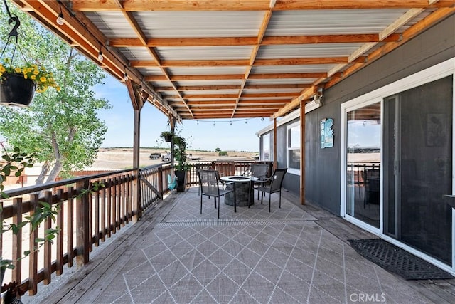 view of patio featuring a fire pit