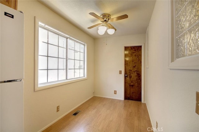 221 E Barker Blvd, Big Bear City, CA 92314 - spare room featuring light wood-style flooring, a ceiling fan, and baseboards