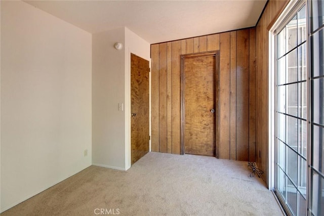 221 E Barker Blvd, Big Bear City, CA 92314 - empty room with carpet and wooden walls