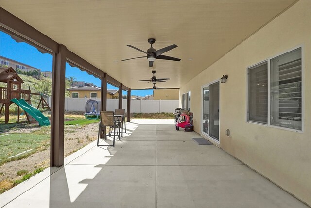 30853 Pony Express Dr, Winchester, CA 92596 - view of patio / terrace with a fenced backyard, a playground, and a ceiling fan