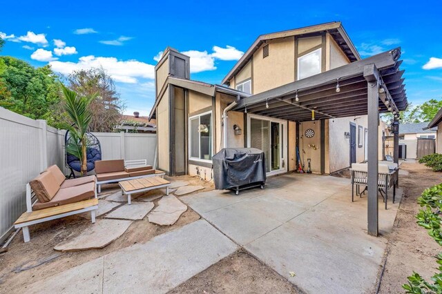 9560 Frank Way, Santee, CA 92071 - back of house featuring stucco siding, a patio, and a fenced backyard